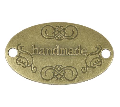 Nášivka Hand Made kovová bronzová 32x19 mm